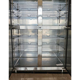 Clear standing four door refrigerated/freezer cabinet